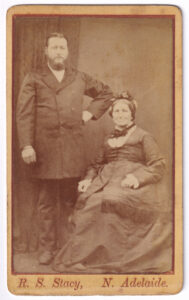 Carte de visite, with a photograph of a man and a woman, from the late 19th century